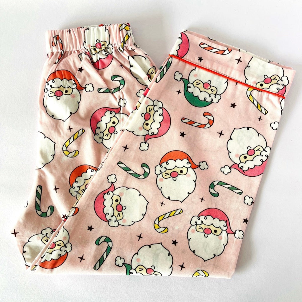 Pink Winking Santa Pyjamas - Pyjamas